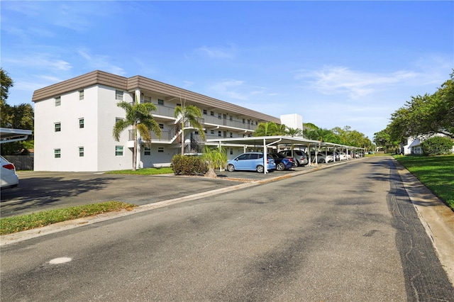 view of property with covered parking