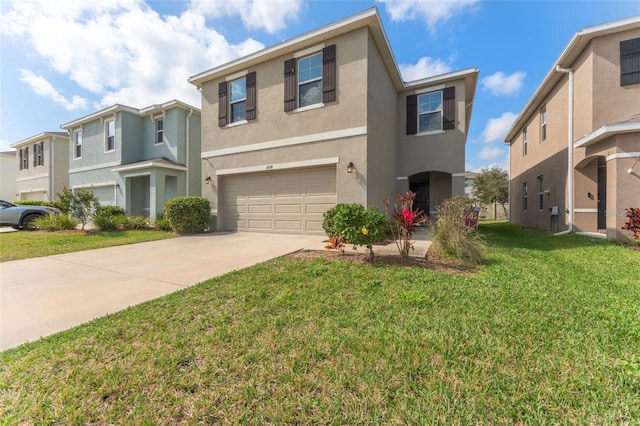 traditional-style house with an attached garage, concrete driveway, a residential view, stucco siding, and a front yard