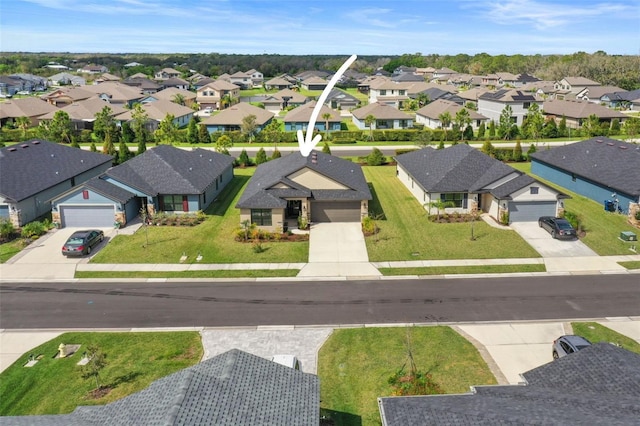 drone / aerial view with a residential view