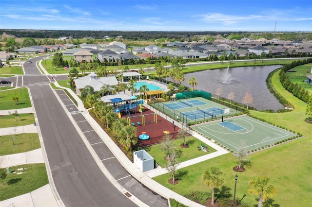 aerial view featuring a residential view and a water view