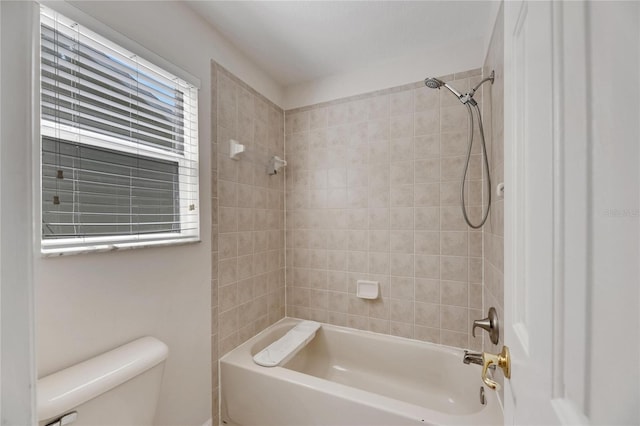 full bathroom featuring toilet and bathing tub / shower combination