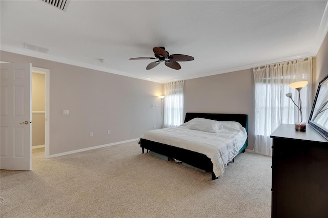 bedroom featuring light carpet, ornamental molding, and visible vents