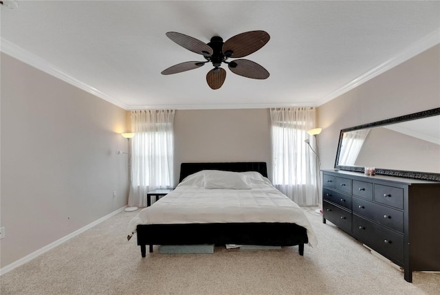 bedroom with baseboards, ceiling fan, ornamental molding, and light colored carpet