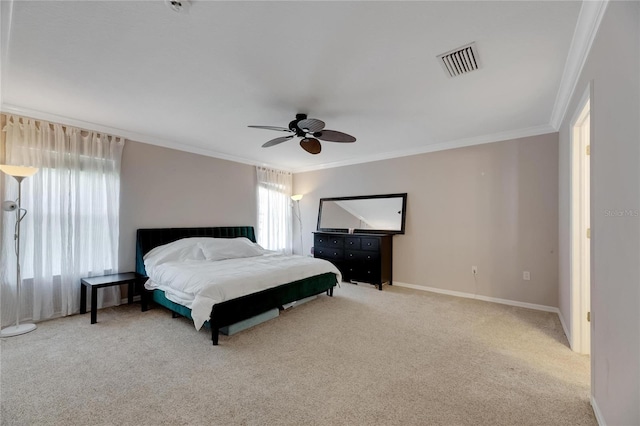 bedroom featuring baseboards, visible vents, light colored carpet, and ornamental molding