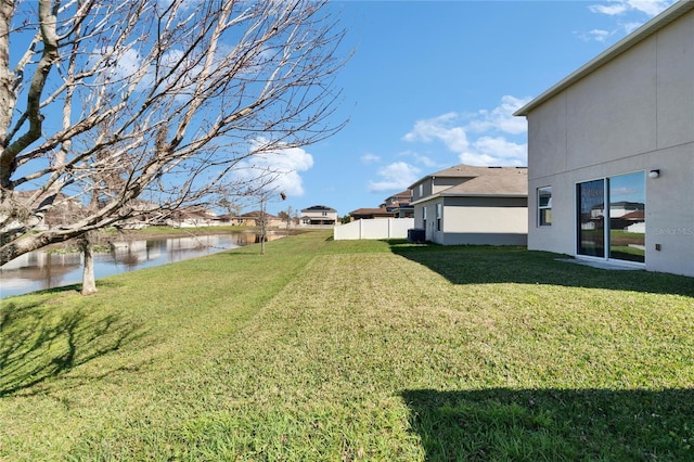 view of yard with a water view