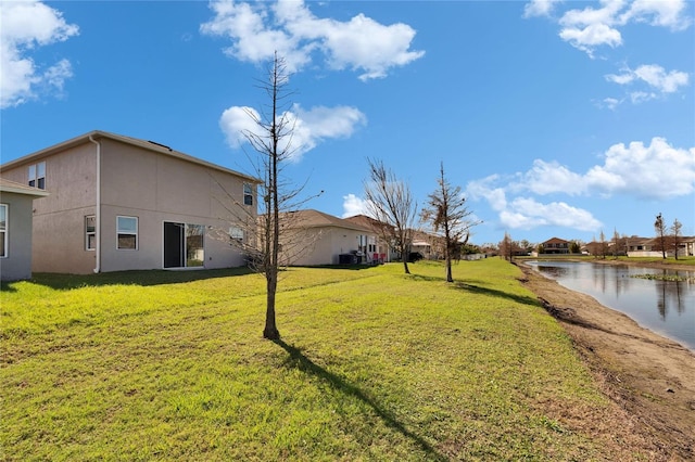 view of yard with a water view