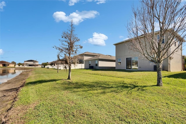 view of yard with a water view