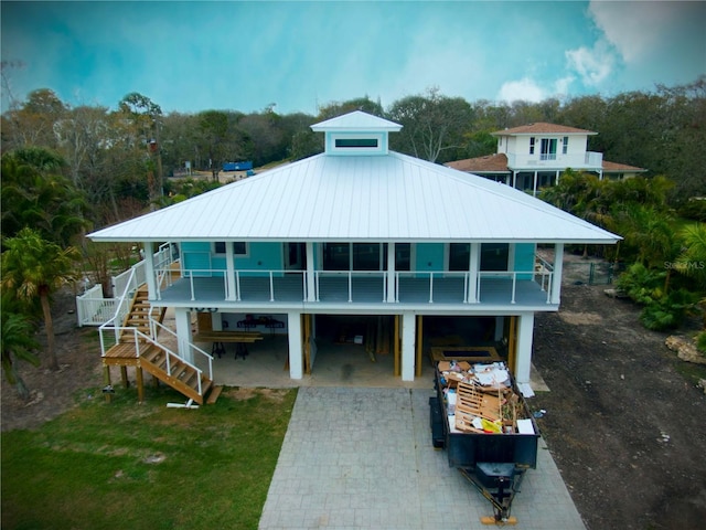 beach home featuring a carport