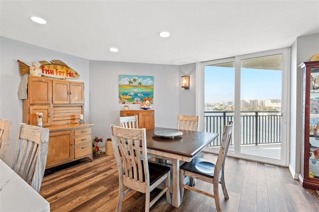 690 Island Way Unit 1003, Clearwater Beach, FL 33767 - dining area featuring wood finished floors and recessed lighting