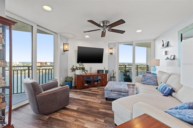 690 Island Way Unit 1003, Clearwater Beach, FL 33767 - living area with floor to ceiling windows, ceiling fan, wood finished floors, and recessed lighting