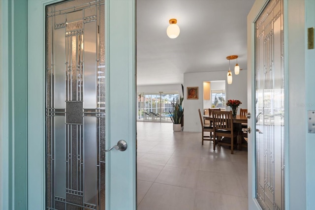 entrance foyer featuring light tile patterned floors