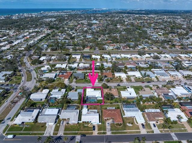 aerial view with a residential view and a water view