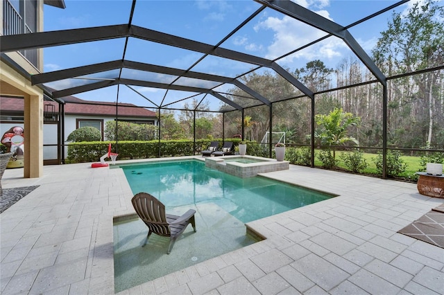 view of swimming pool with a patio, a lanai, and a pool with connected hot tub