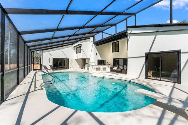 outdoor pool featuring glass enclosure, outdoor lounge area, a diving board, and a patio