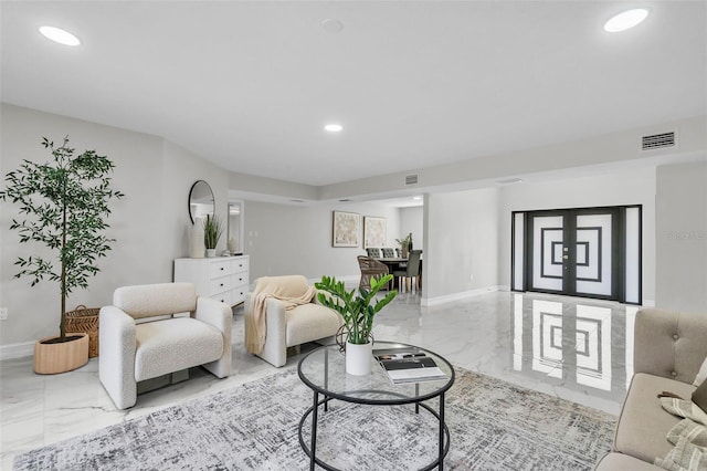 4520 Pine Hollow Dr, Tampa, FL 33624 - living room featuring marble tiled floors, recessed lighting, and baseboards