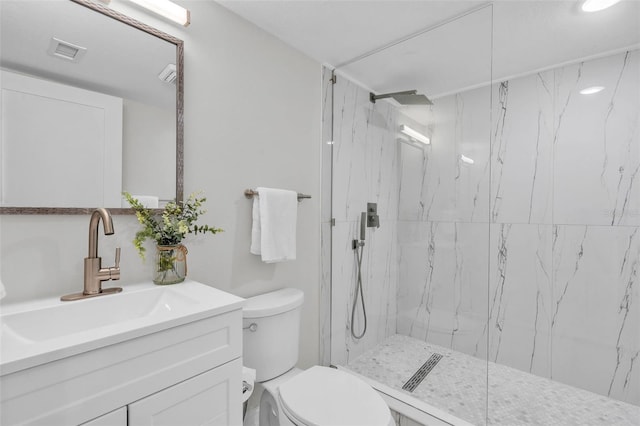 4520 Pine Hollow Dr, Tampa, FL 33624 - full bathroom with toilet, a marble finish shower, and vanity