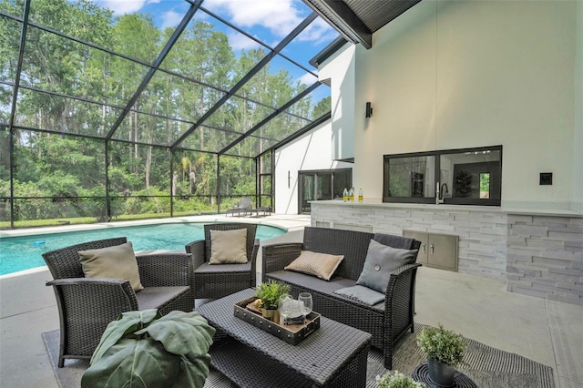 4520 Pine Hollow Dr, Tampa, FL 33624 - view of patio with an outdoor pool, a lanai, and an outdoor living space