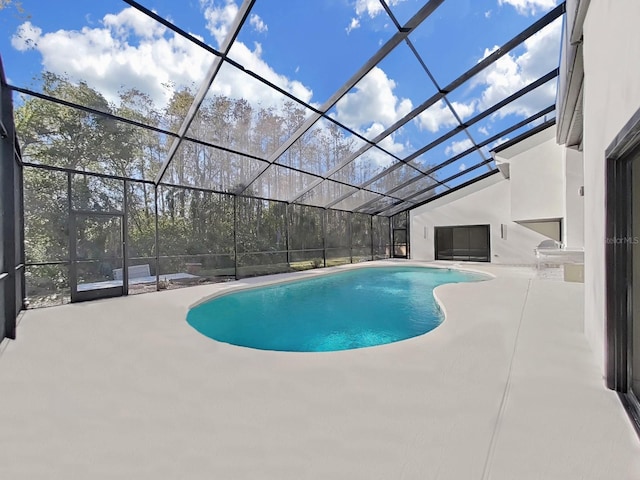 4520 Pine Hollow Dr, Tampa, FL 33624 - outdoor pool with a patio and a lanai