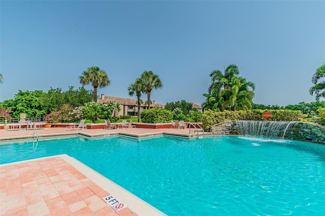 pool with a patio area