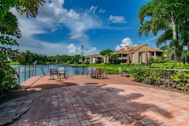 view of pool featuring a water view