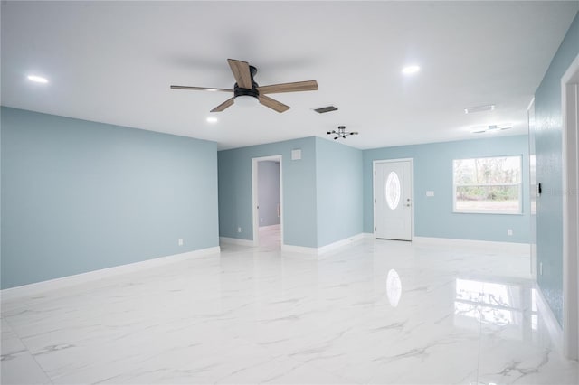 interior space featuring baseboards, visible vents, a ceiling fan, marble finish floor, and recessed lighting