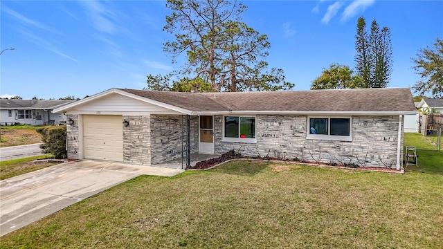 ranch-style home with a garage and a front yard