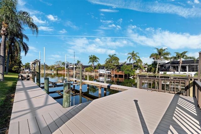 dock area featuring a water view and boat lift