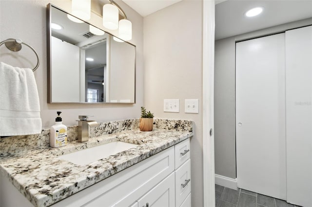 bathroom featuring visible vents and vanity