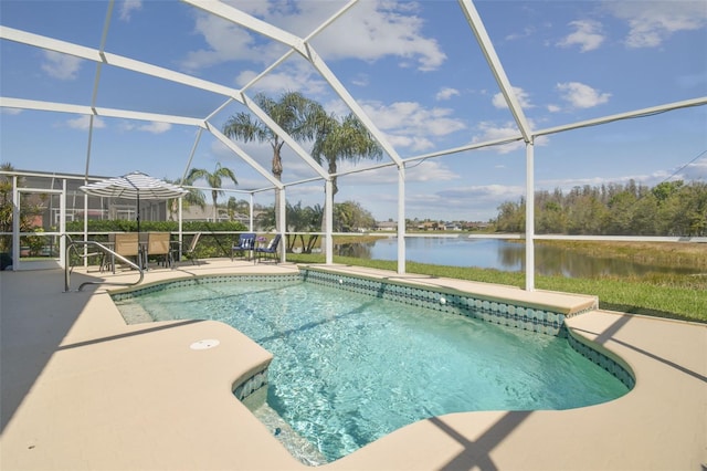 outdoor pool with a water view, a lanai, and a patio area