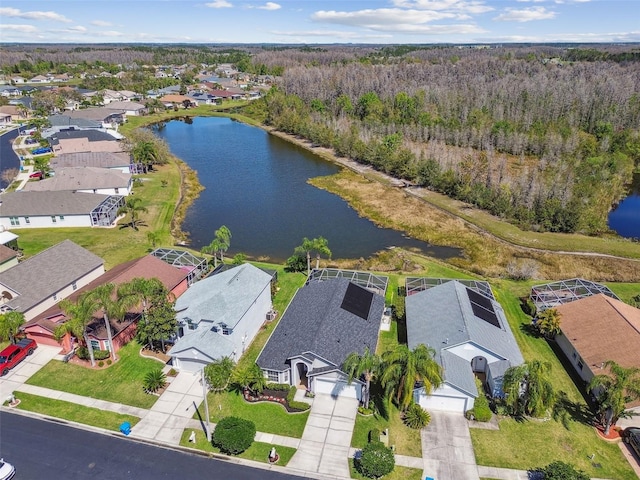 bird's eye view with a residential view and a water view