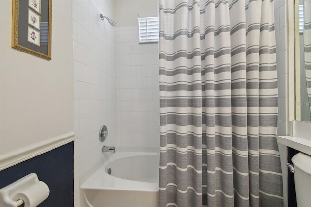 full bathroom with shower / bath combo with shower curtain