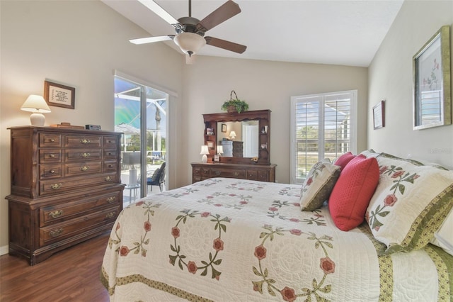 bedroom featuring access to outside, multiple windows, wood finished floors, and vaulted ceiling