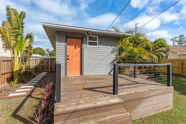 view of outbuilding featuring a fenced backyard