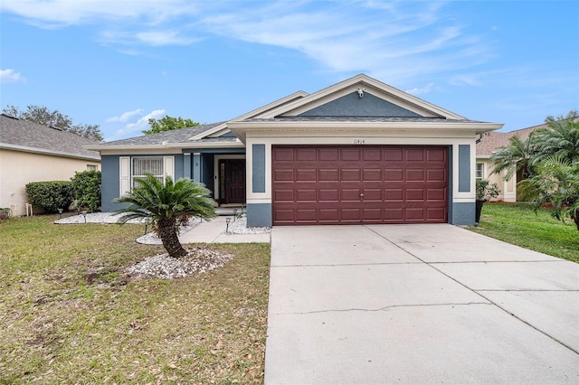 single story home with a front yard, an attached garage, stucco siding, and driveway