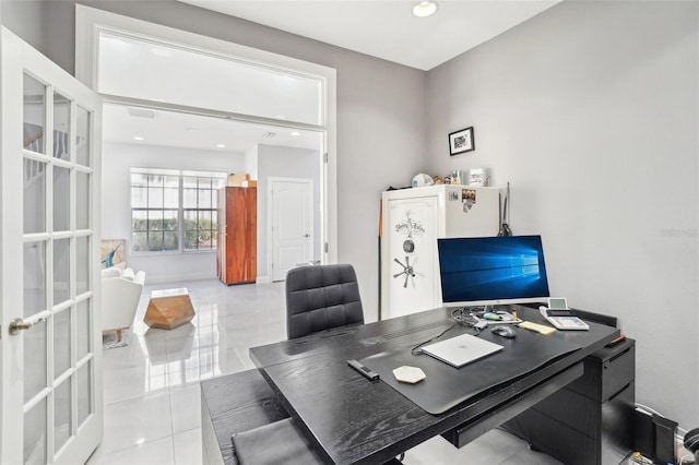 tiled office space featuring french doors and recessed lighting