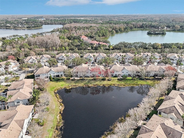 aerial view with a water view and a residential view