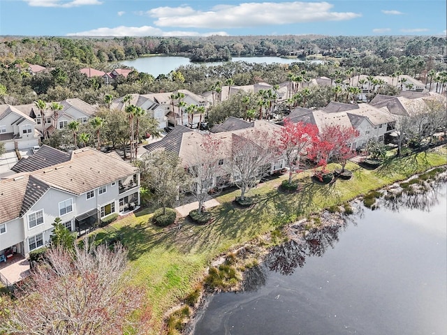 birds eye view of property featuring a residential view and a water view