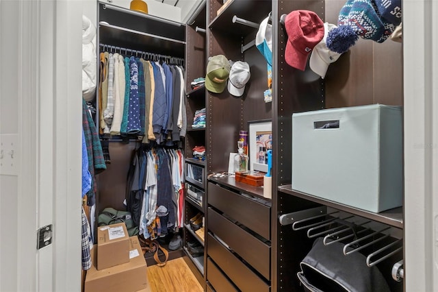 spacious closet featuring wood finished floors