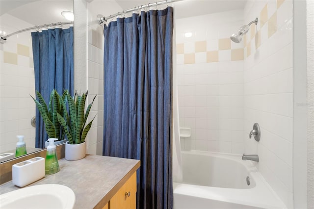 full bath with shower / bath combo with shower curtain and vanity