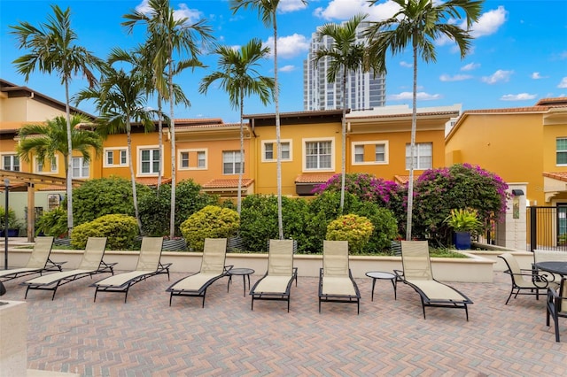 view of home's community with a patio