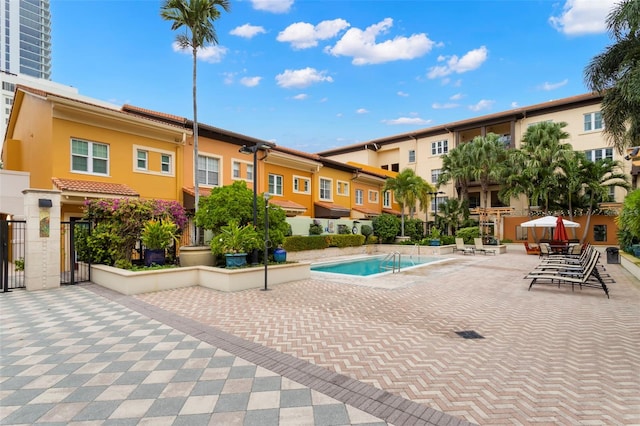 community pool with a patio