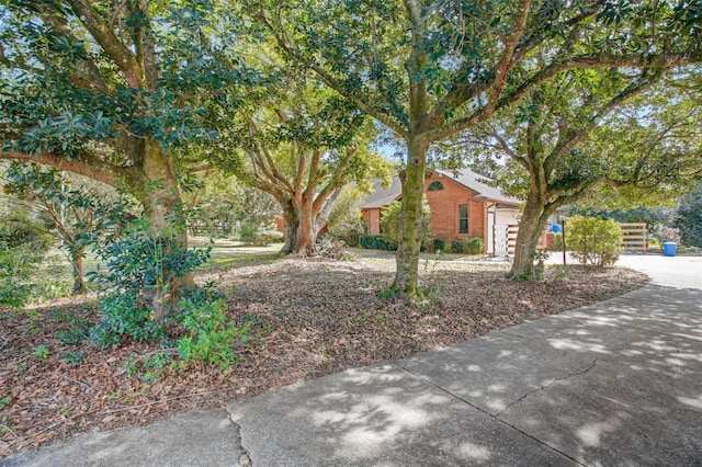 exterior space featuring a garage and concrete driveway