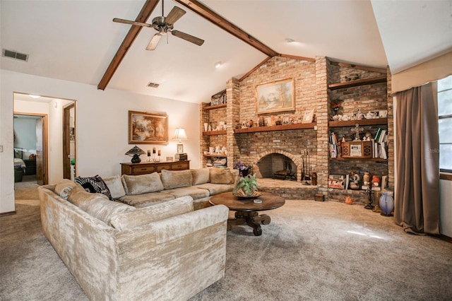 living area with a fireplace, visible vents, vaulted ceiling with beams, and carpet flooring