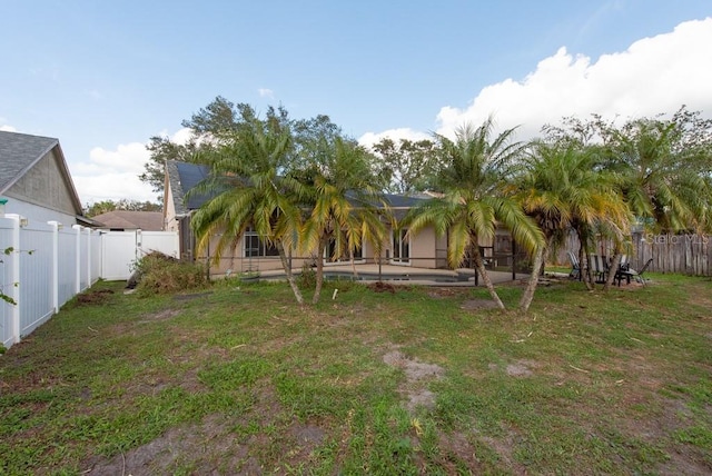 view of yard featuring a fenced backyard