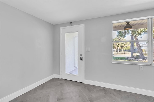 doorway with baseboards