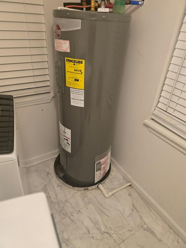 utility room with water heater