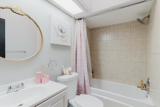 bathroom featuring shower / bathtub combination with curtain, toilet, and vanity