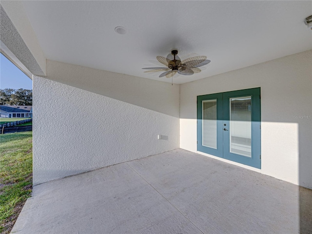 view of patio / terrace featuring a ceiling fan and french doors