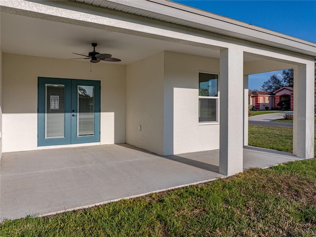 view of patio / terrace with french doors and ceiling fan