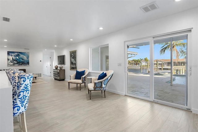 1984 Kansas Ave NE, Saint Petersburg, FL 33703 - sitting room featuring recessed lighting, visible vents, light wood-style flooring, and baseboards